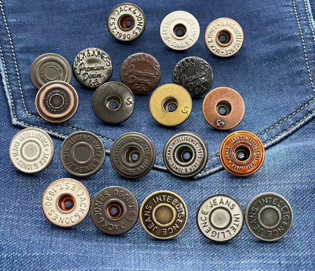 Metal jeans buttons in a range of plated finishes on denim